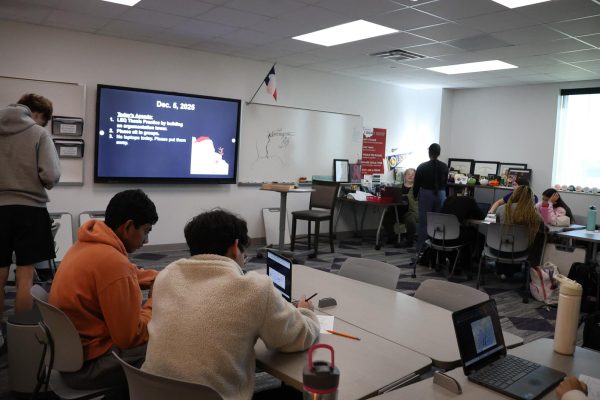 Working diligently, Mrs. Rachael Cummings' class completes assignments. She teaches AP US and World History. "I love teaching," Cummings said. "If you give me something to teach, I will have fun with it."