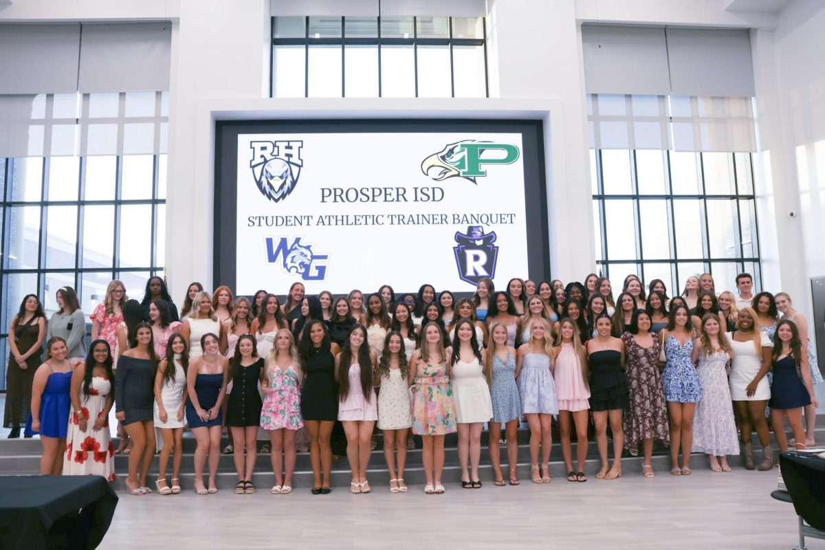Standing side by side, the Prosper ISD student training programs pose for a photo. The banquet was held at Richland High School. It began at 6:30 p.m.